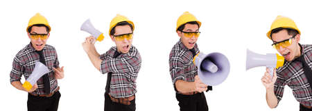 Young construction worker with loudspeaker isolated on whiteの写真素材