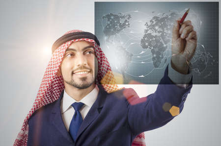 Arab man in world travel conceptの写真素材