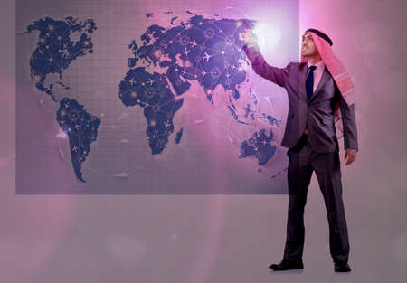 Arab man in world travel conceptの写真素材