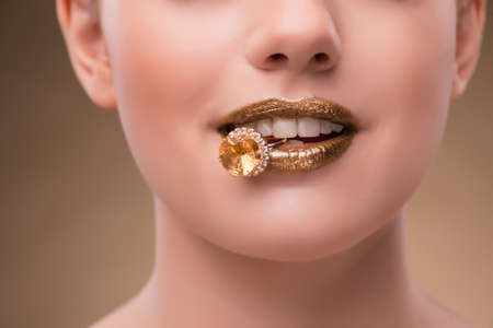 Elegant woman with jewellery in fashion conceptの写真素材