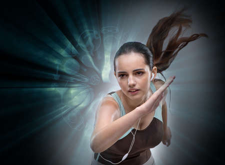 Woman running in sports conceptの写真素材