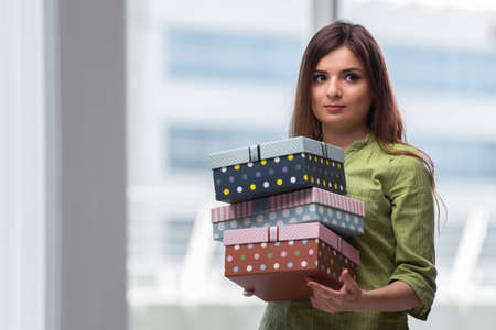 Young woman excited with giftboxの写真素材