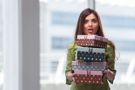 Young woman excited with giftboxの写真素材