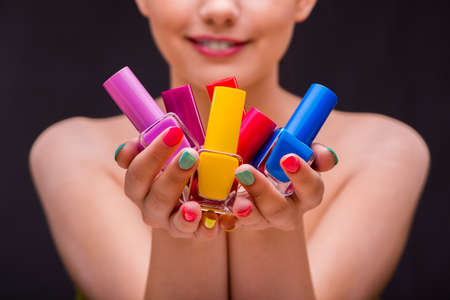 Woman in hand treatment manicure concept
