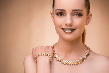 Nice woman wearing elegant jewelleryの写真素材