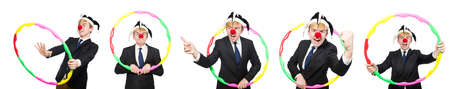 Businessman clown in funny concept isolated on whiteの写真素材