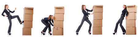Businesswoman with boxes isolated on whiteの写真素材