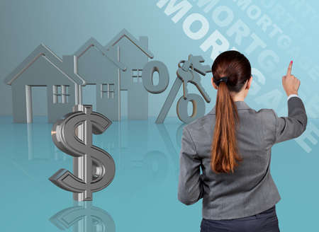Businesswoman in real estate mortgage conceptの写真素材