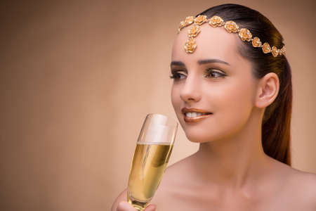 Young woman with champagne glassの写真素材