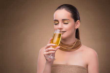 Young woman with champagne glassの写真素材