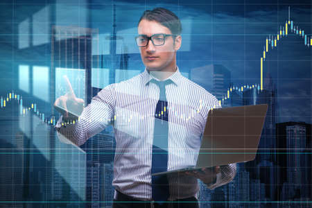 Young businessman in online trading concept