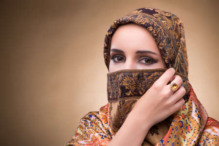 Young woman in traditional muslim clothingの写真素材