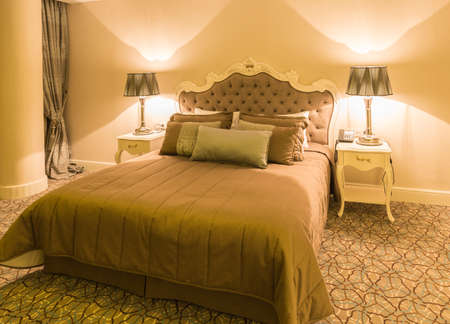 Modern hotel room with big bed