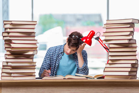 Young student under stress before examsの写真素材