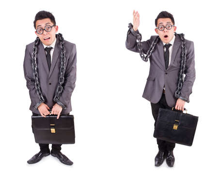 Businessman chained isolated on whiteの写真素材