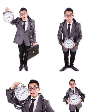 Businessman holding alarm clock isolated on whiteの写真素材