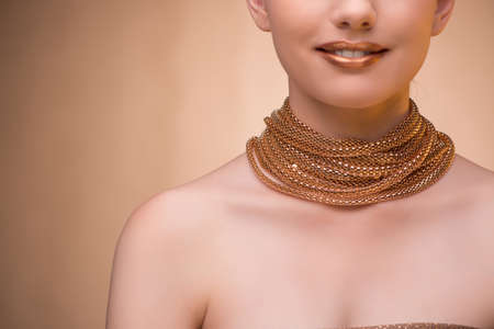 Nice woman wearing elegant jewelleryの写真素材