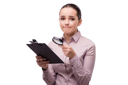 Young student with magnifying glass isolated on whiteの写真素材