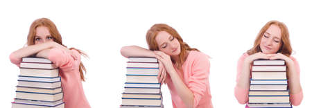 Woman student with stacks of booksの写真素材