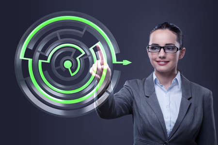 Businesswoman with maze in difficult situations conceptの写真素材