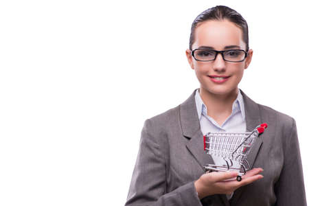 Woman with shopping cart isolated on whiteの写真素材