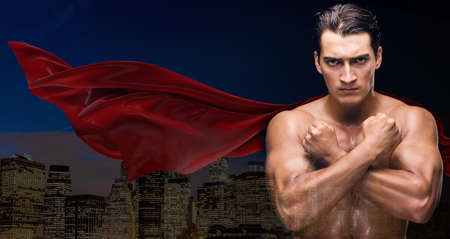 Man in red cover protecting cityの写真素材