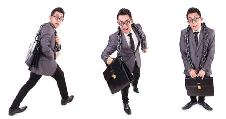 Businessman chained isolated on whiteの写真素材