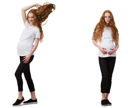 Pregnant woman in composite image isolated on whiteの写真素材