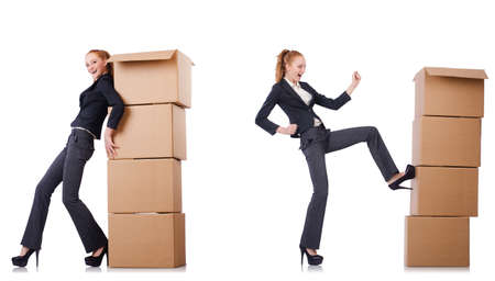 Businesswoman with boxes isolated on whiteの写真素材