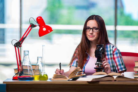 Female student preparing for chemistry examsの写真素材
