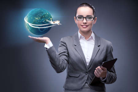 Businesswoman in air travel conceptの写真素材