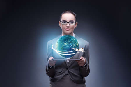 Businesswoman in air travel conceptの写真素材