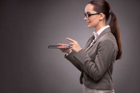 Young businesswoman working with tablet computerの写真素材