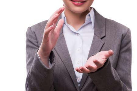 Businesswoman holding hands isolated on whiteの写真素材