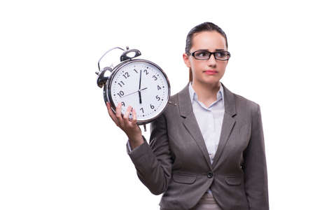 Businesswoman with clock in business conceptの写真素材