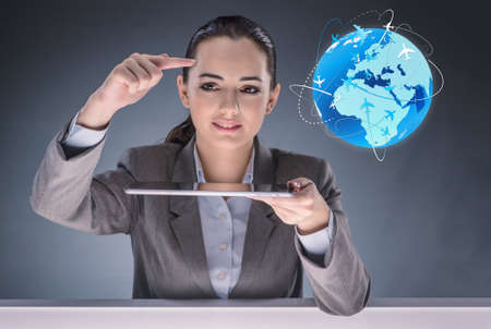 Businesswoman in air travel conceptの写真素材