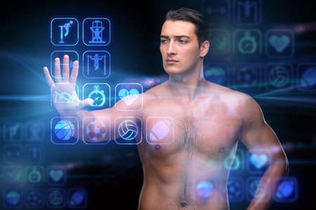 Young muscular man in sports conceptの写真素材