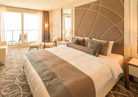 Modern hotel room with big bed