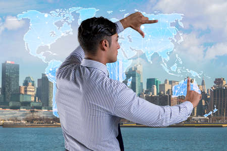 Businessman pressing buttons in futuristic concept