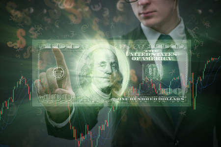 Businessman and dollar in business conceptの写真素材