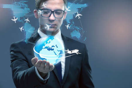 Businessman in air travel conceptの写真素材