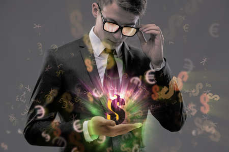 Businessman and dollar in business conceptの写真素材