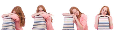 Woman student with stacks of booksの写真素材