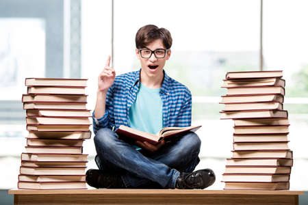 Young man student preparing for college exams