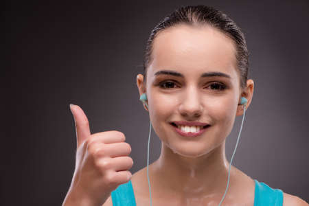 Woman in sports concept with thumb up