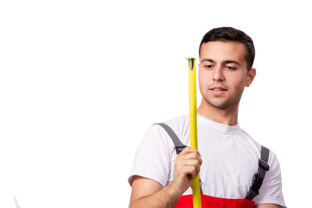 Young man in industrial concept isolated on white