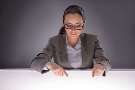 Young businesswoman working on the tableの写真素材