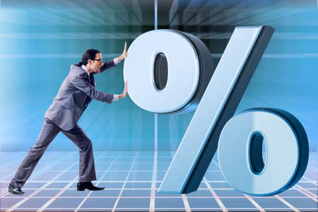 Businessman in high interest rates conceptの写真素材