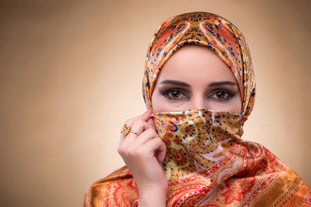 Young woman in traditional muslim clothingの写真素材