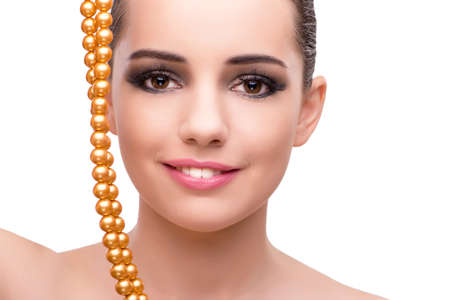 Woman with jewellery accessories isolated on whiteの写真素材